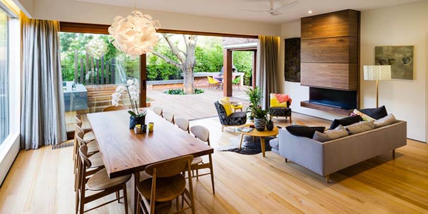 Interior design gold coast with open living area and timber floors wooden chairs and a table