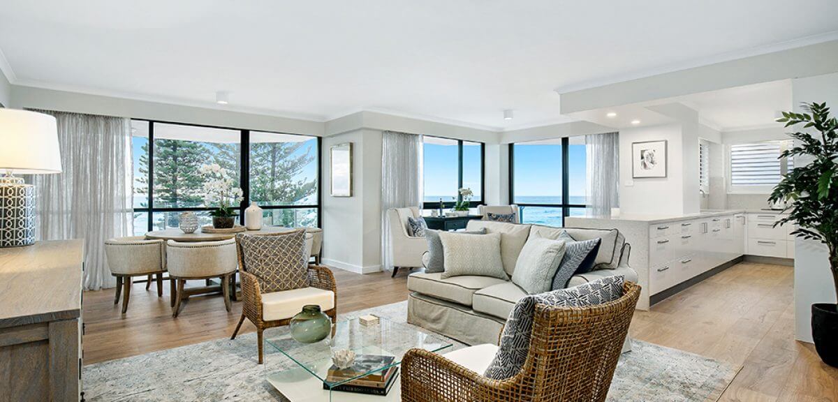 Interior design gold coast apartment with white furniture overlooking the gold coast ocean coast